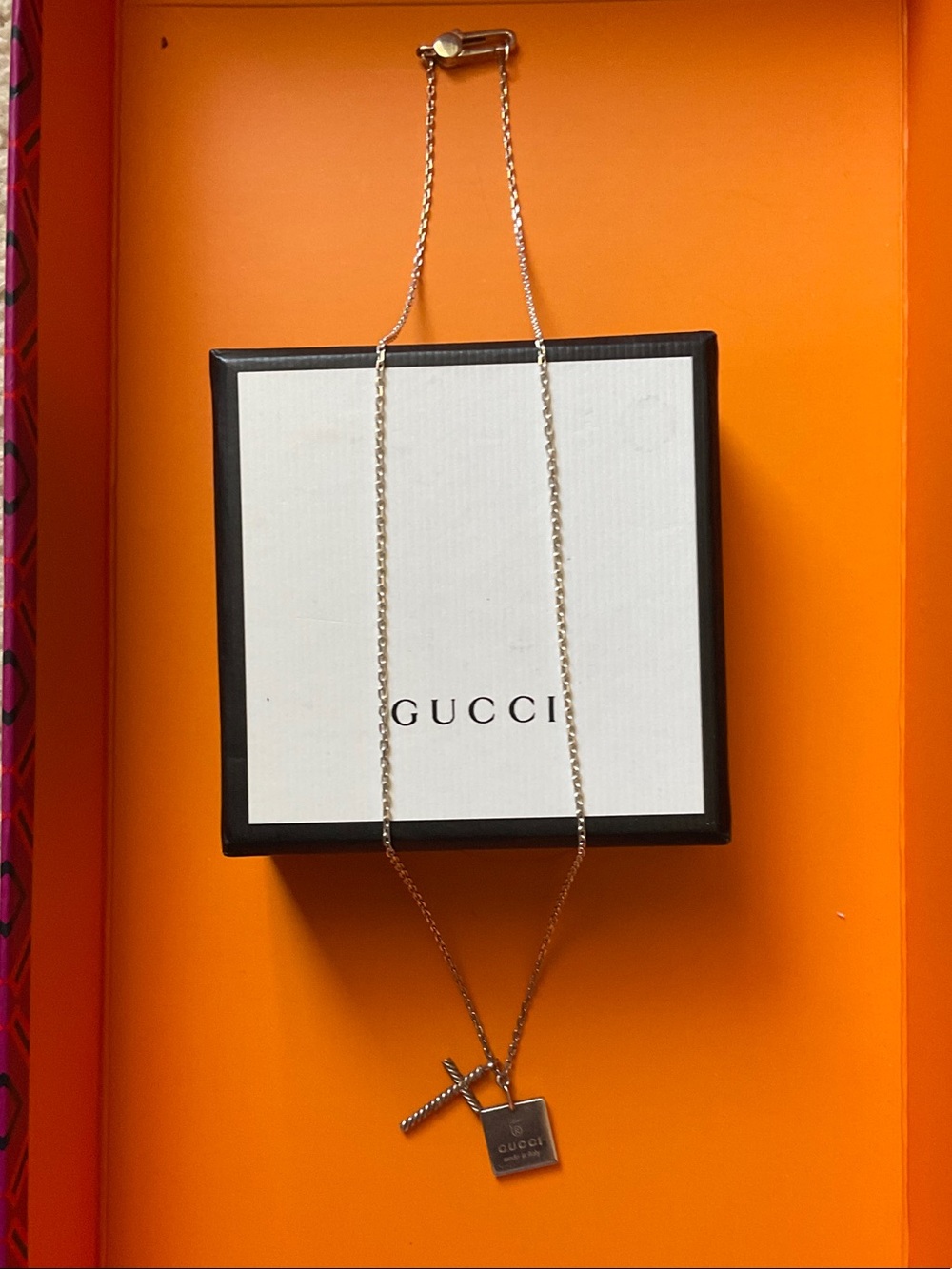 Gucci silver-tone pendant necklace with cross and tag charms